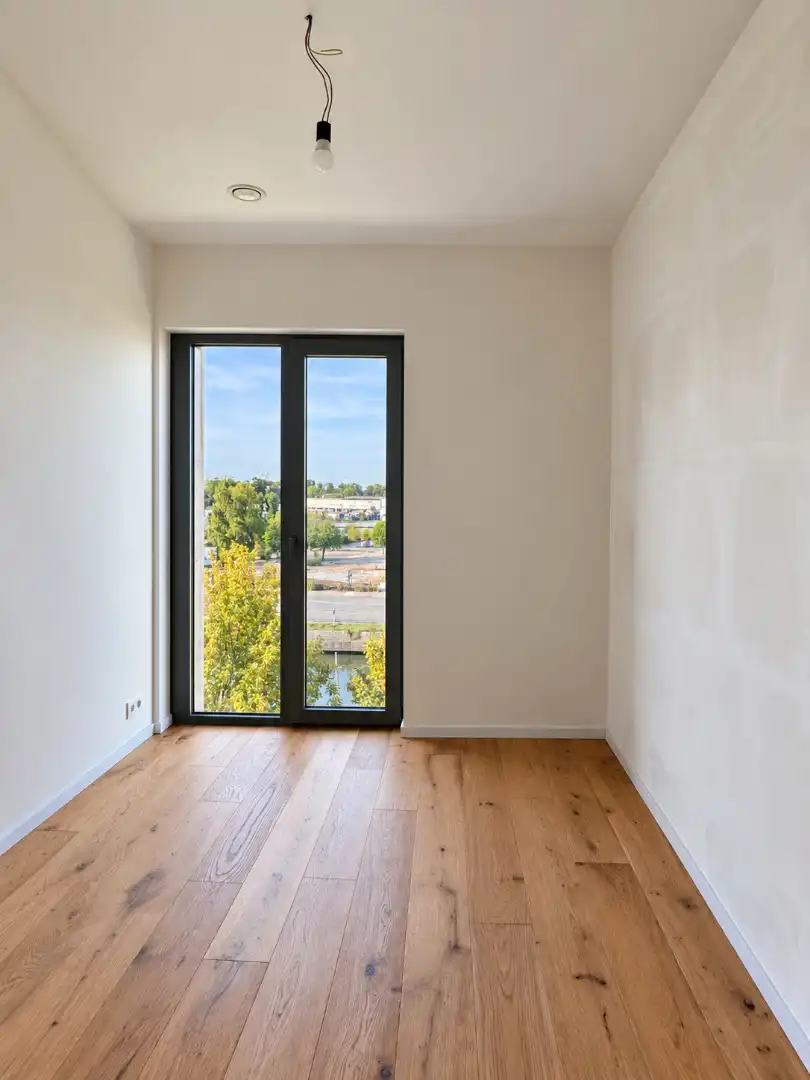 Ruim 3-slaapkamerappartement aan het water met zicht op de Brugse skyline foto 10