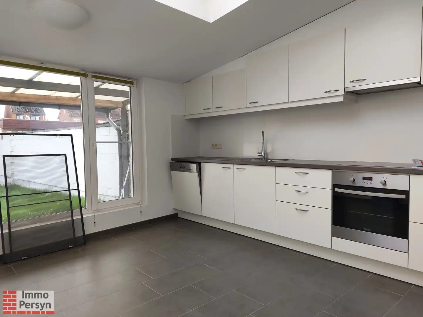 Gezellige rijwoning met kleine stadstuin foto 7
