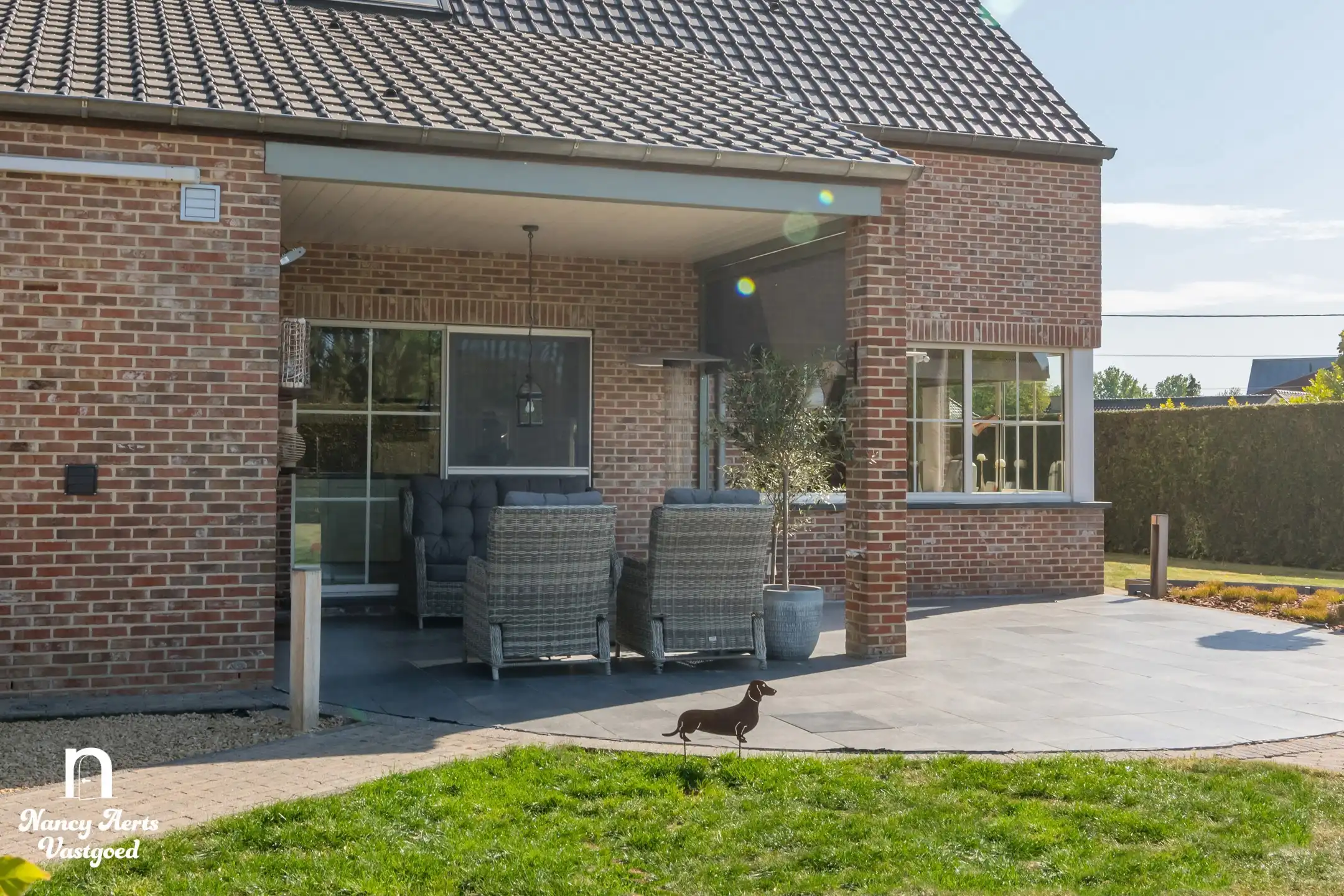 Instapklare woning met goed draaiende kapperszaak aan huis foto 59