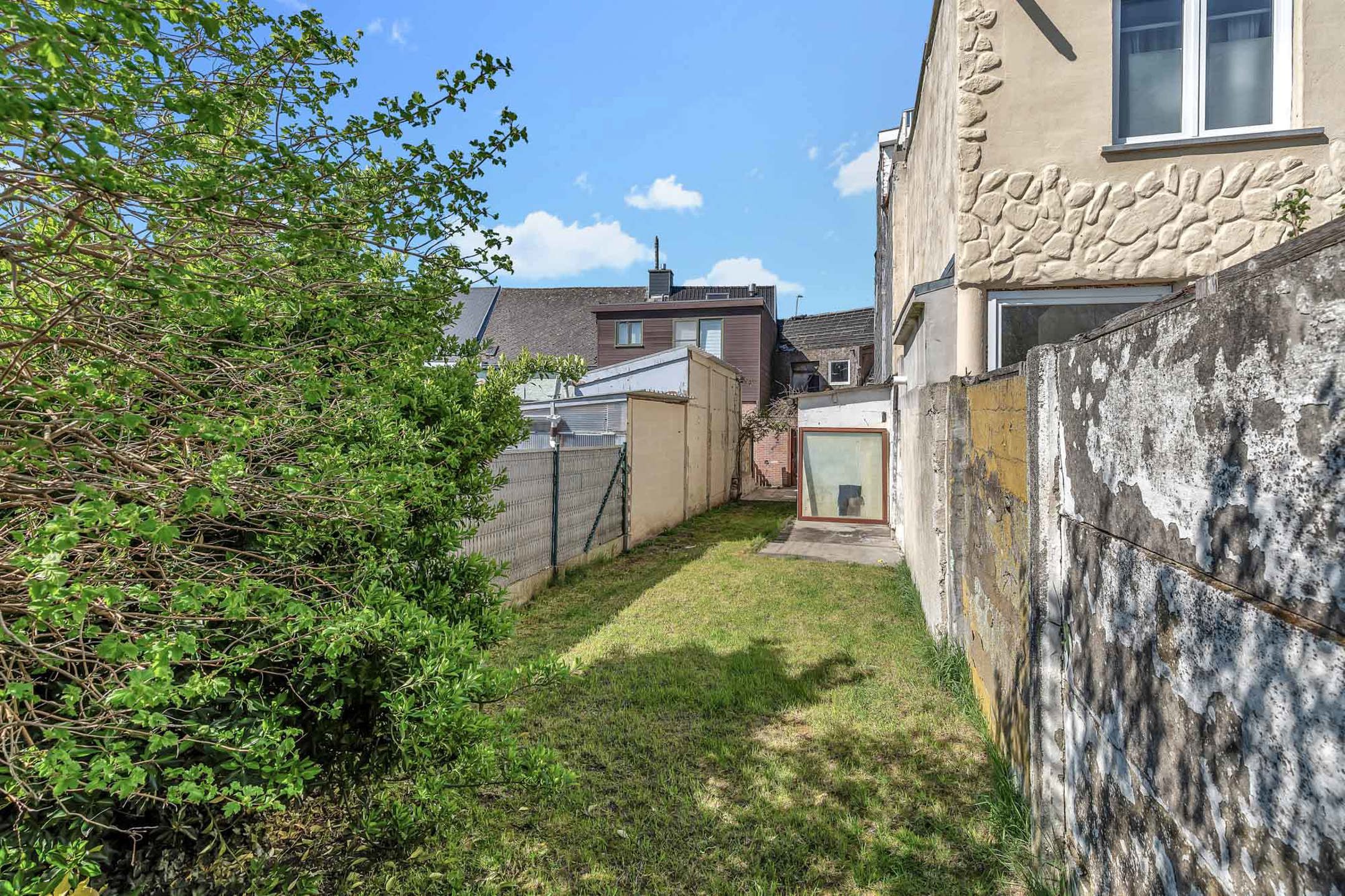 Te renoveren woning op strategische locatie te Ninove foto 2