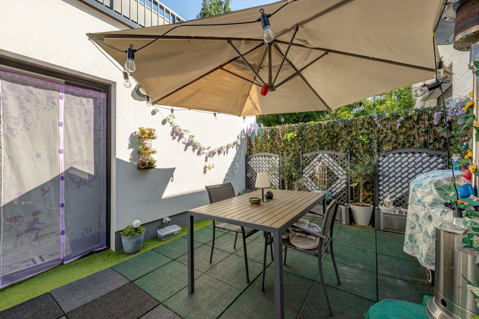 Gerenoveerd gelijkvloers appartement (149m²) met 2slpk, stadstuin en garagebox! foto 11