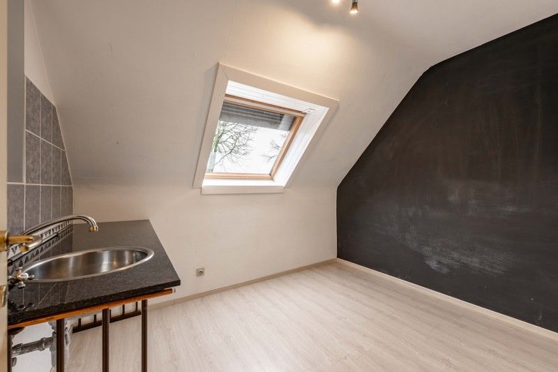 Instapklare halfopen woning met 4 slaapkamers en zonnige tuin TE KOOP in Oostrozebeke! foto 15