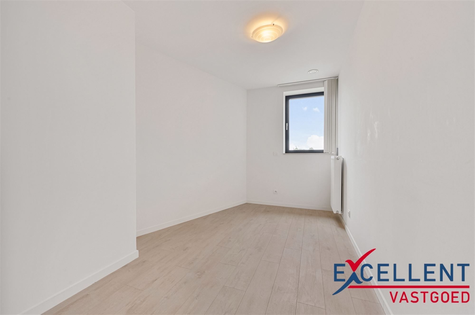 Recent 3-slaapkamerappartement op de markt van Deinze foto 7