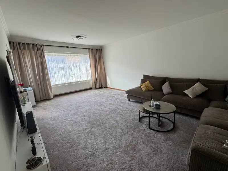 Gelijkvloers 2 slpk. appartement met tuin en garage foto 4