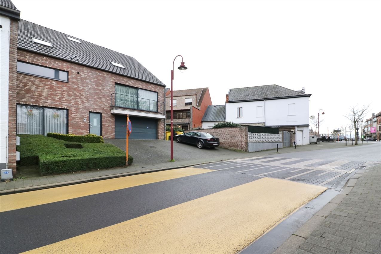 Duplex-appartement met 2 slpk., terras, autostaanplaats in centrum foto 25