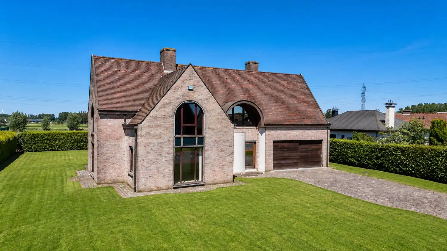 Ruime en degelijk gebouwde villa op groen perceel van 1318m² met zicht op de velden foto 28