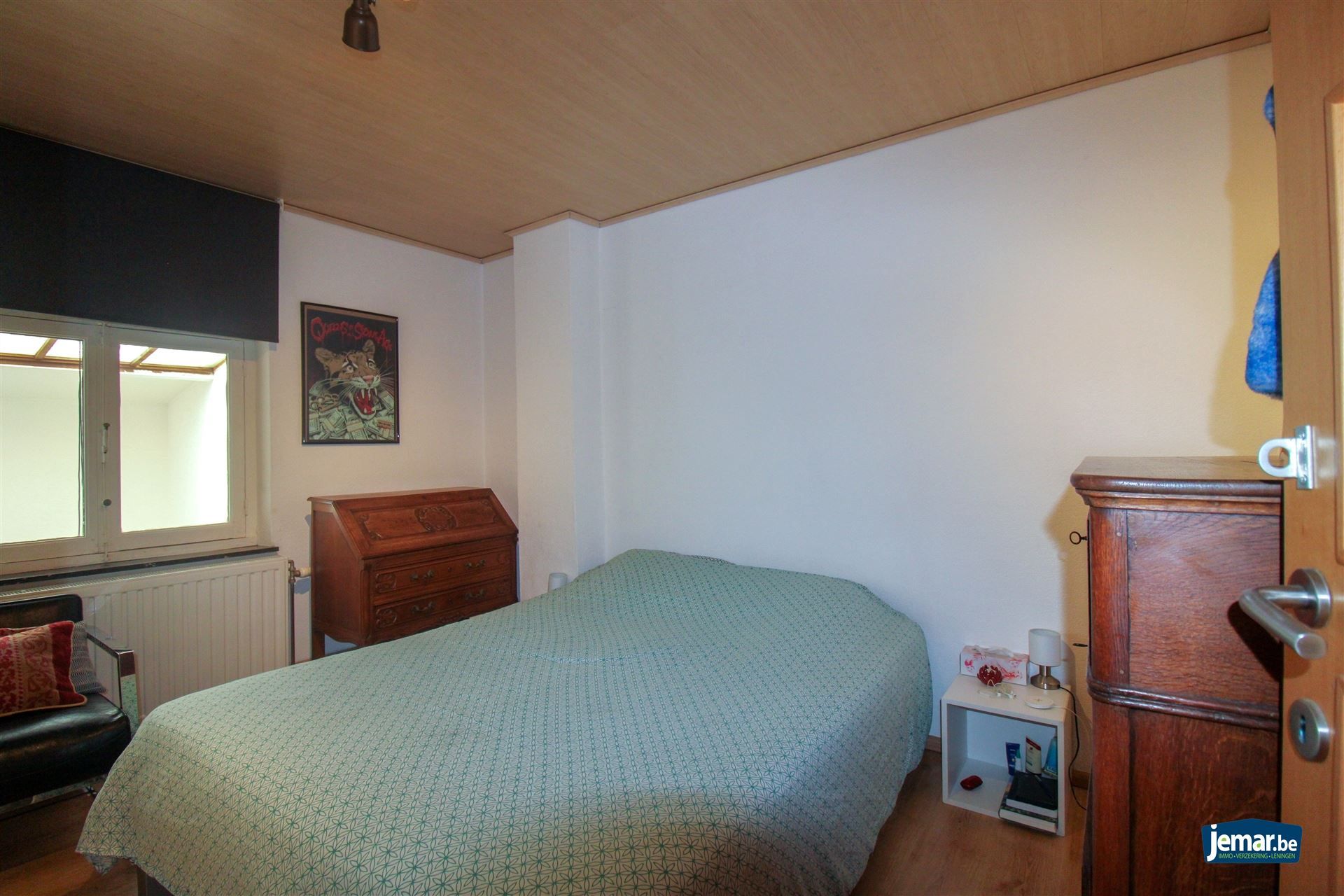 Starterswoning met 2 slaapkamers, zonnepanelen en garage in het hart van Kotem! foto 8