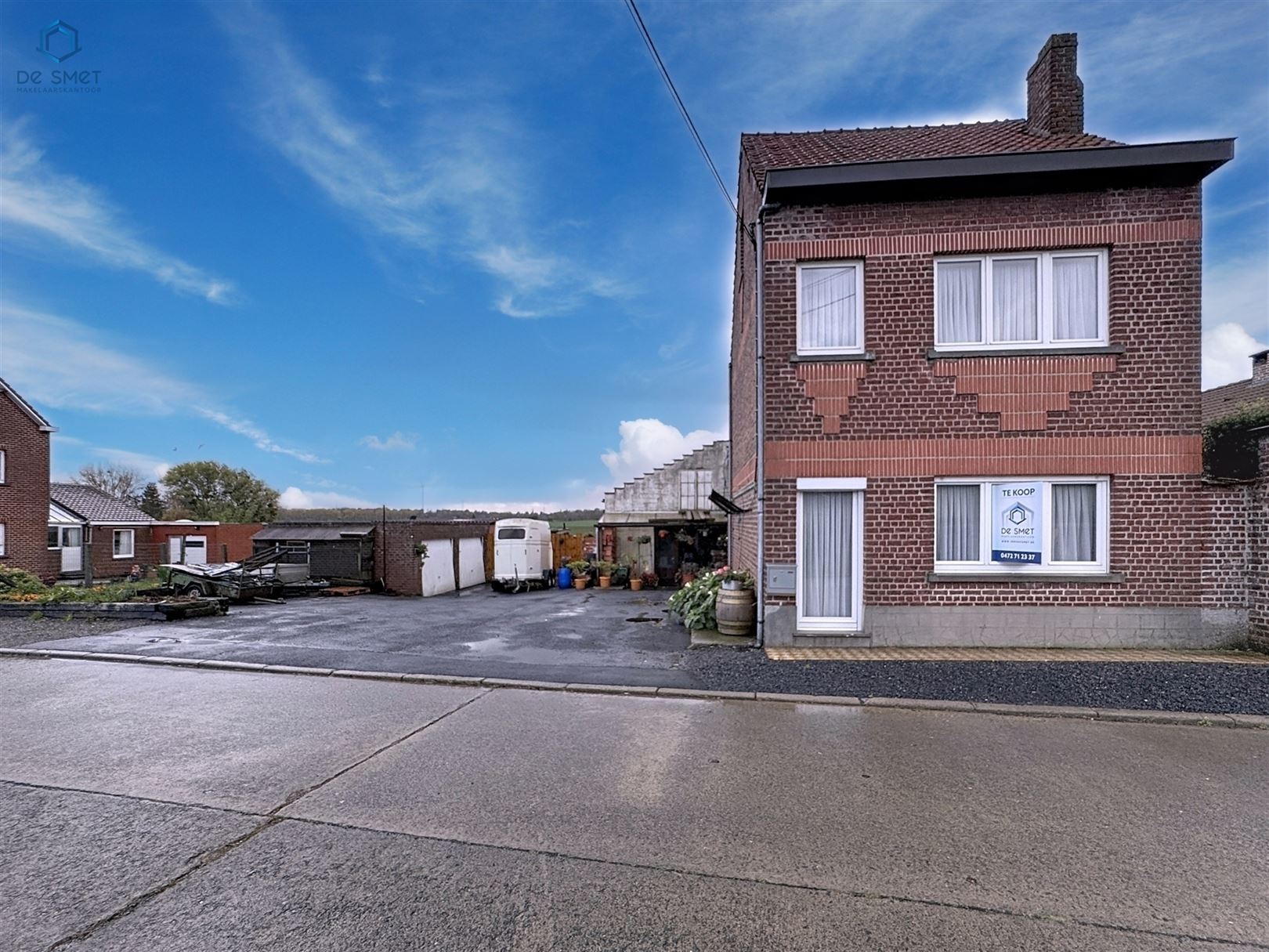 Rustige woning met handelsruimte/loods, 2 slaapkamers en dubbele garage in Beert foto {{pictureIndex}}