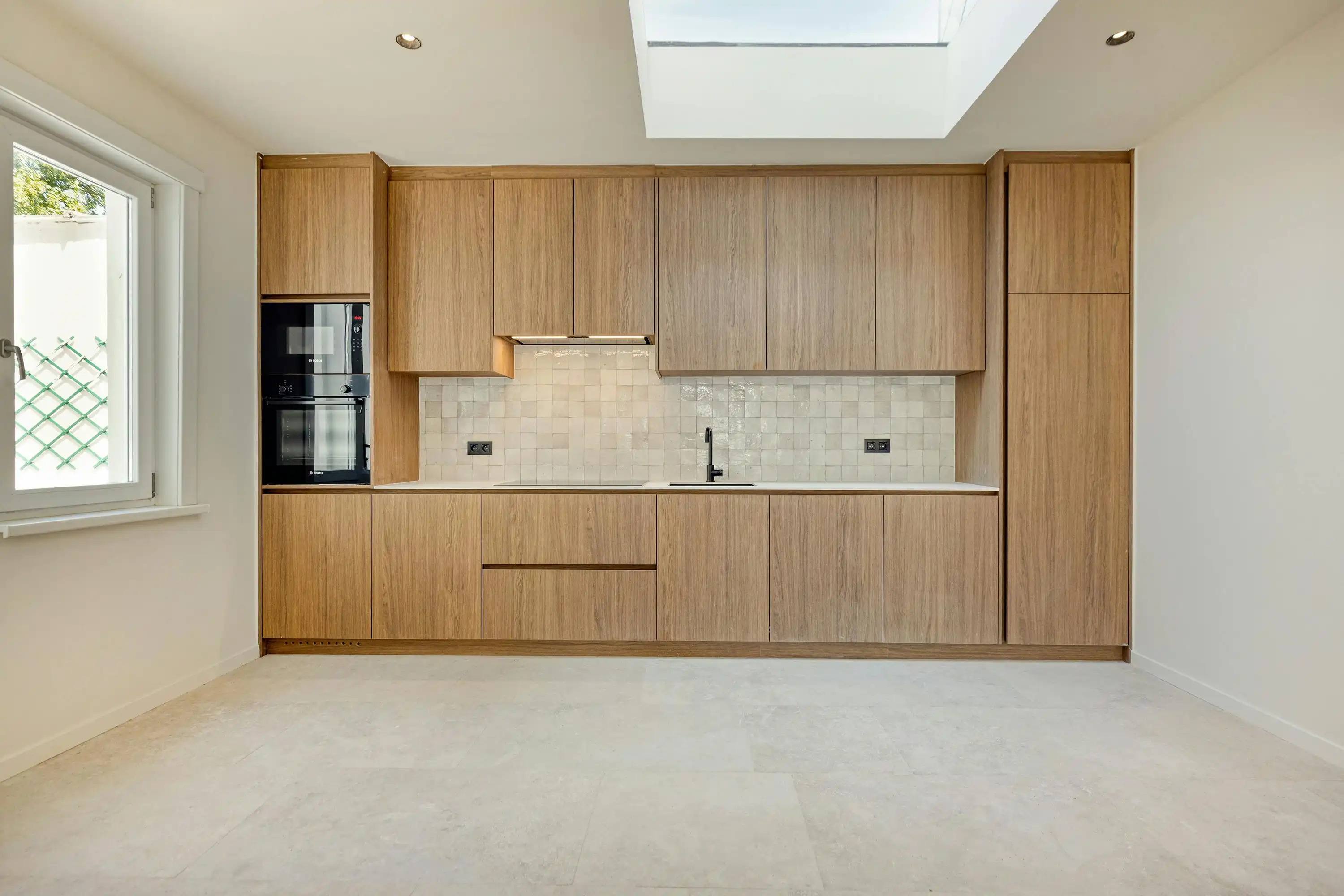 Gerenoveerde gezinswoning met vijf slaapkamers te Merelbeke foto 5