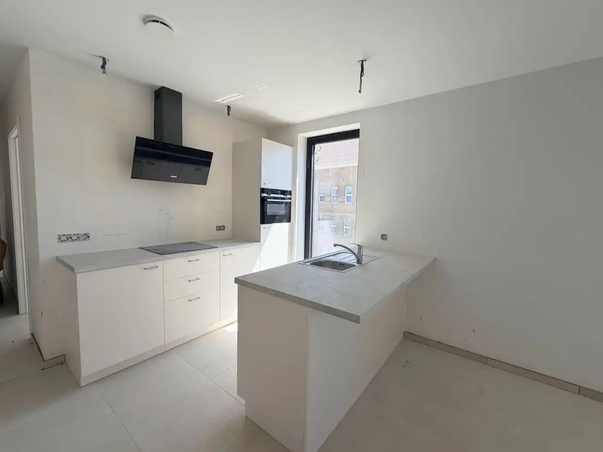 Modern nieuwbouwappartement met 2 slaapkamers en ruim terras in centrum Lubbeek foto 6