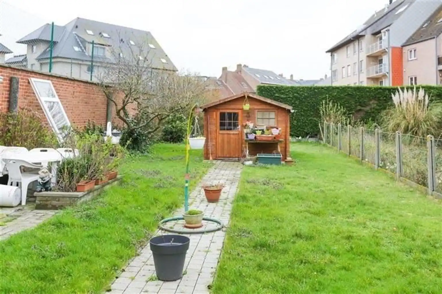 Te koop: te renoveren rijwoning op toplocatie foto 4