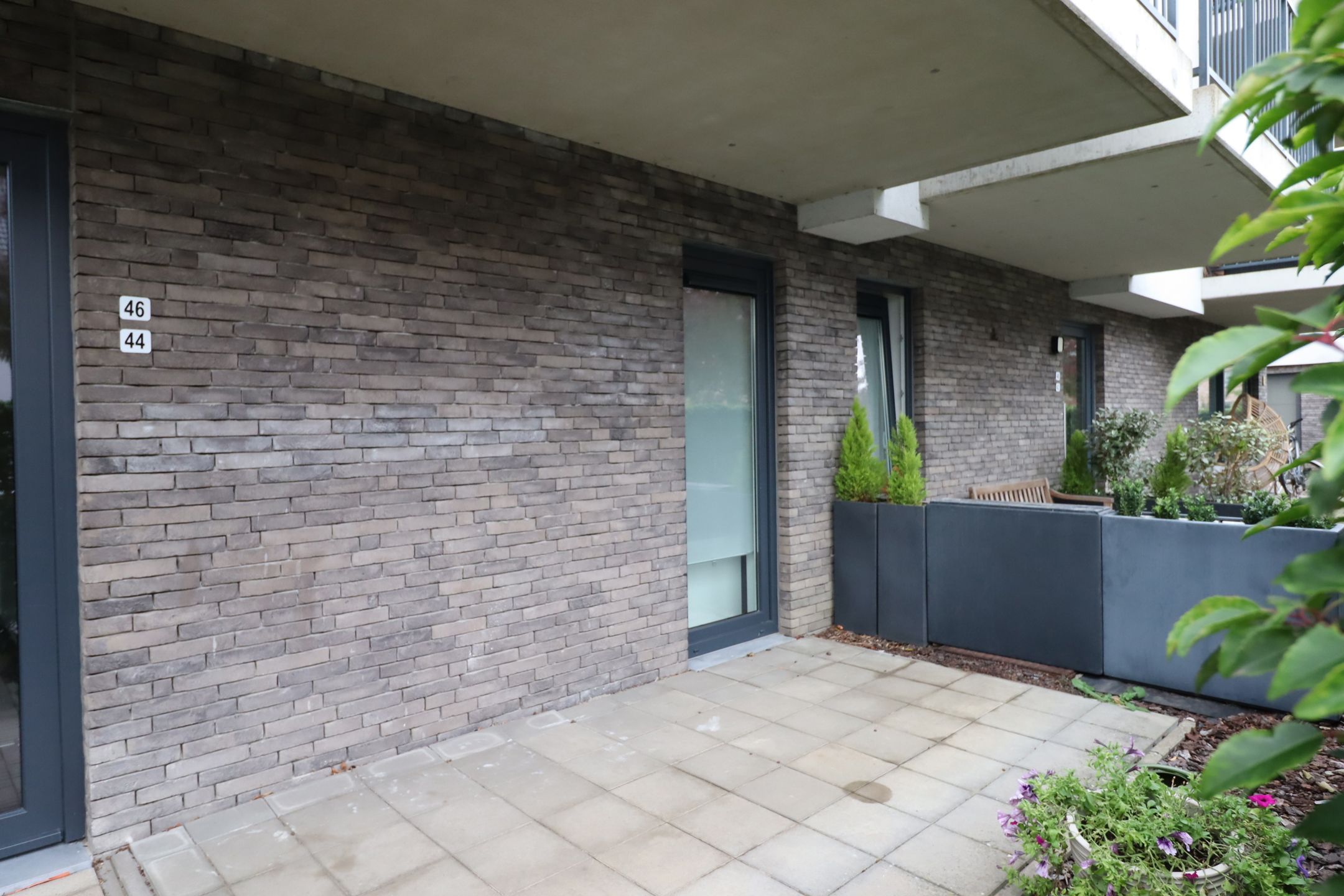 Recent en energiezuinig gelijkvloers appartement met tuin en terras in Bornem foto 2