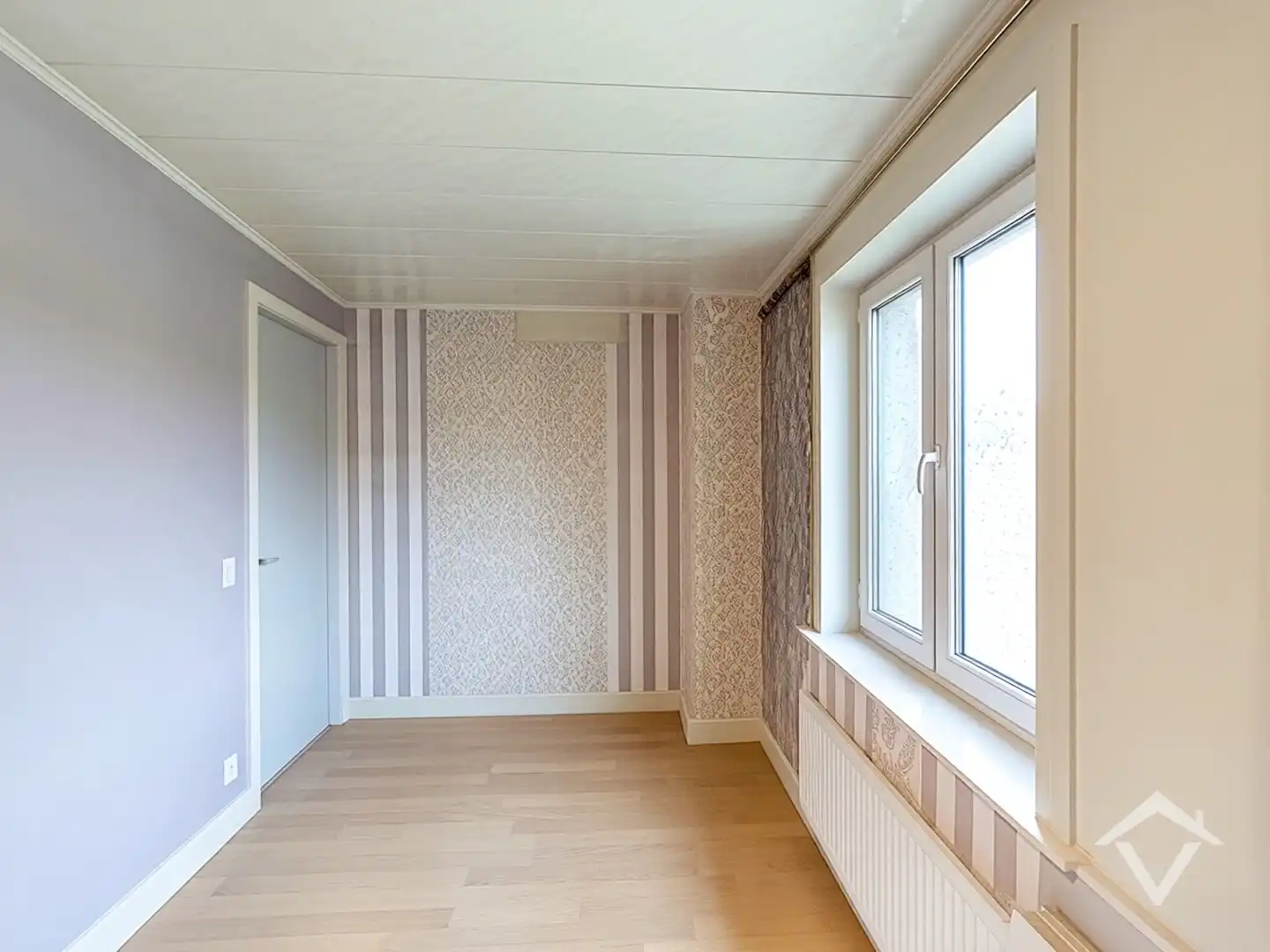 Instapklare woning met twee slaapkamers en terrastuin op één uiterst centrale ligging te Roeselare foto 12