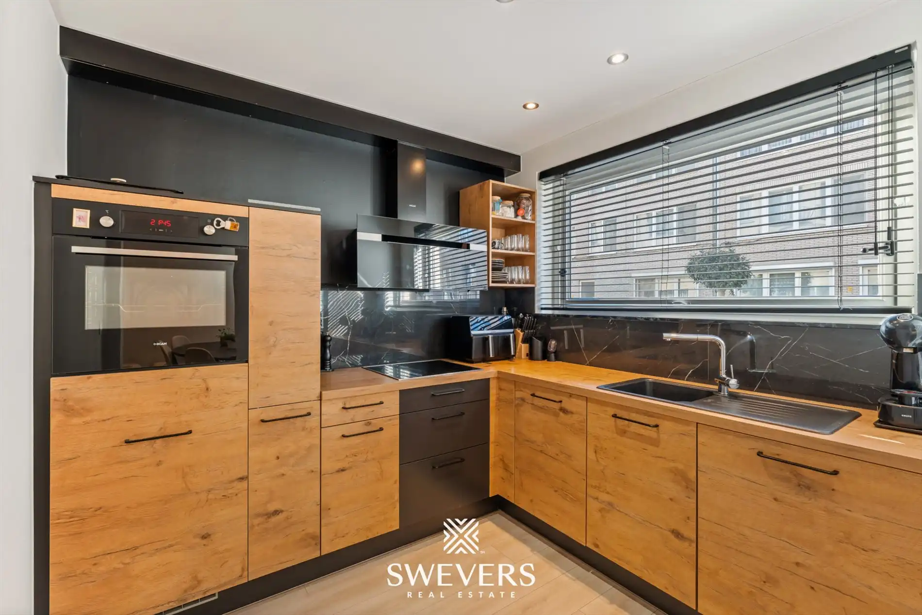 Uitstekend gelegen appartement met 2 slaapkamers en private garagebox. foto 9