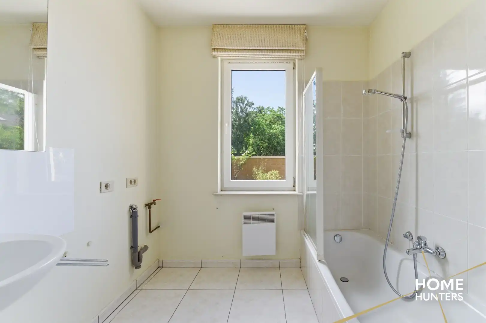Instapklaar gelijkvloers appartement met 2 slaapkamers en ruime tuin foto 20