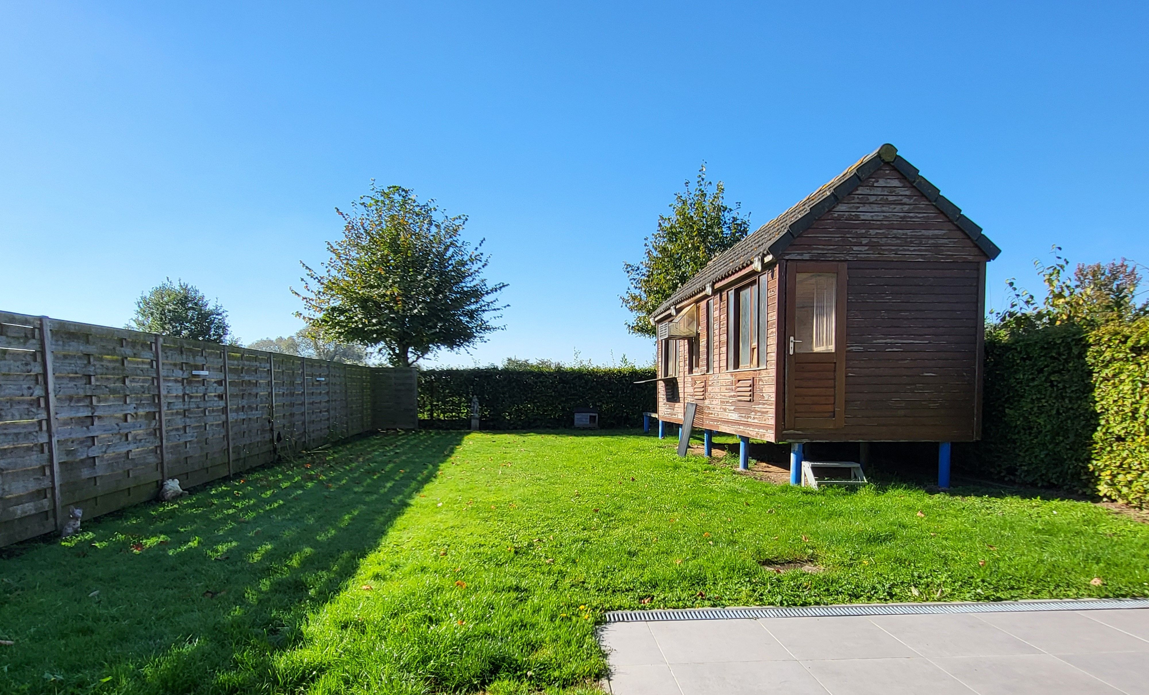 Prachtige woning op 456m² met zonnige aangelegde tuin en garage!  foto 8