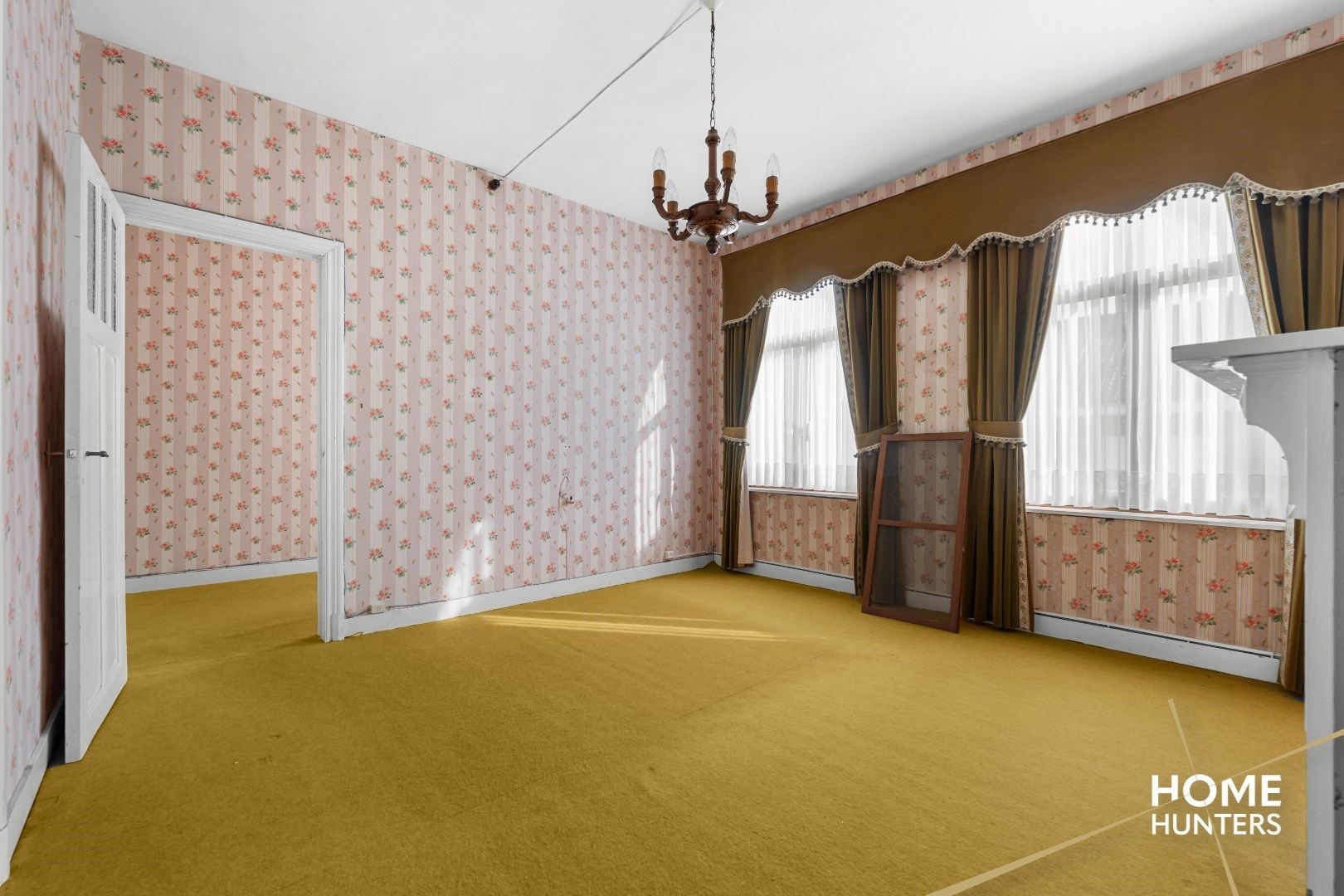 Authentiek herenhuis in Mesen – een renovatieparel met potentieel foto 14