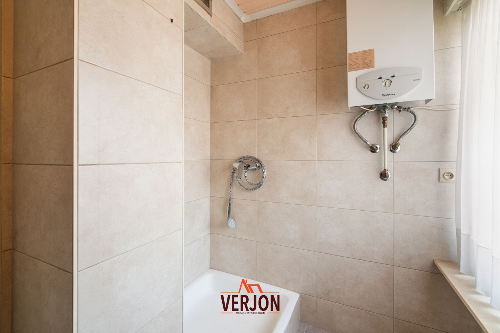 Woning met zuidgerichte tuin te koop in Kachtem! foto 14