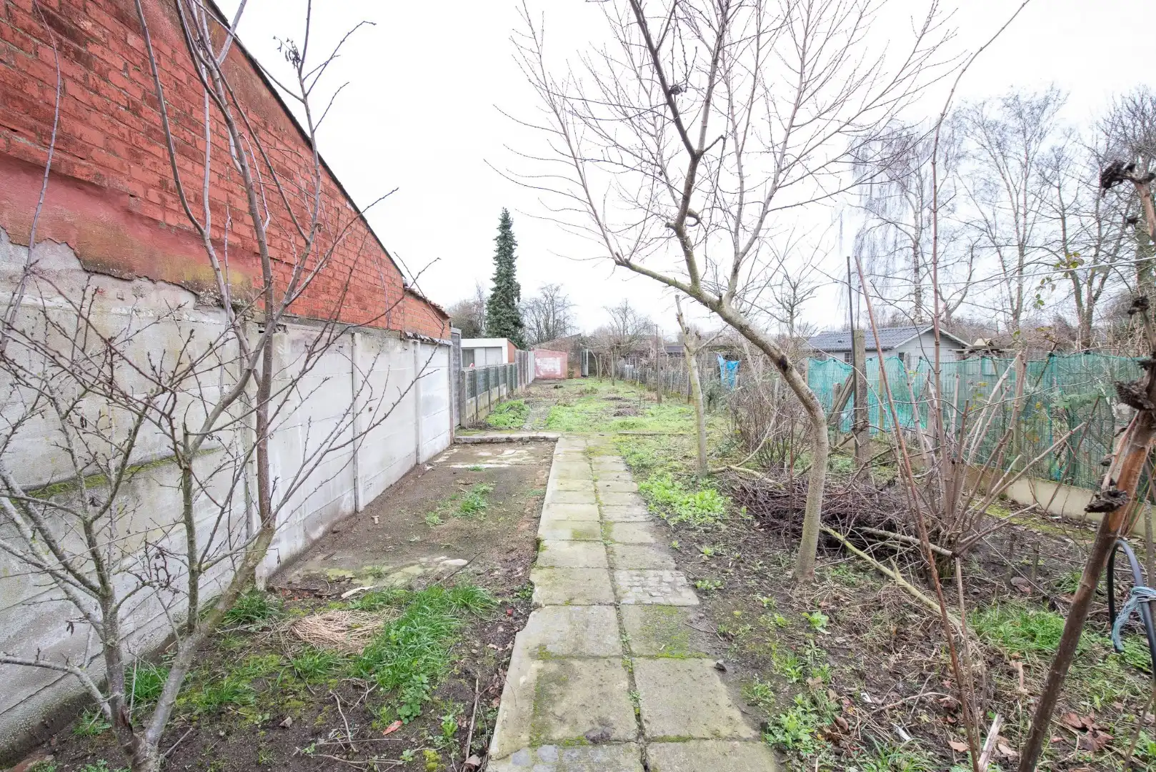 Te koop in Waregem – Halfopen bebouwing met renovatiepotentieel! foto 17