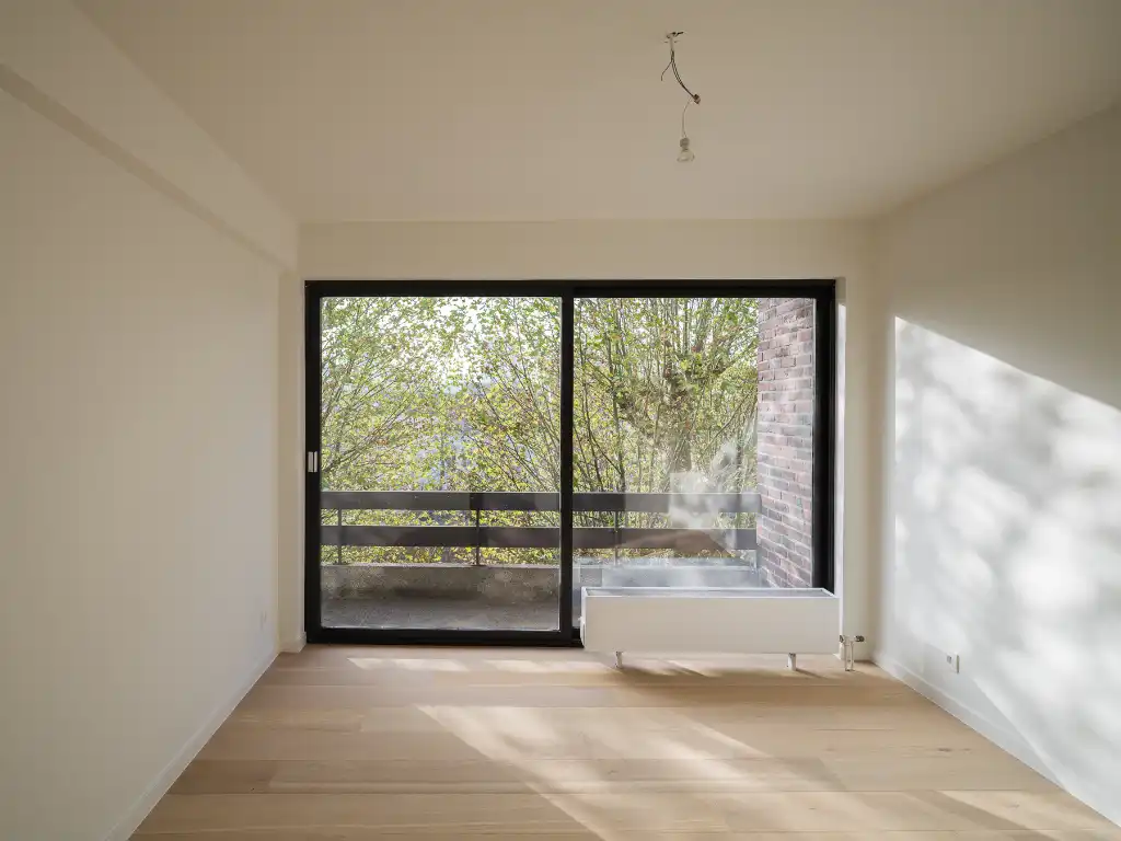 Coupure Rechts – Lichtrijk gerenoveerd éénslaapkamerappartement met terras en zicht op het water foto 11