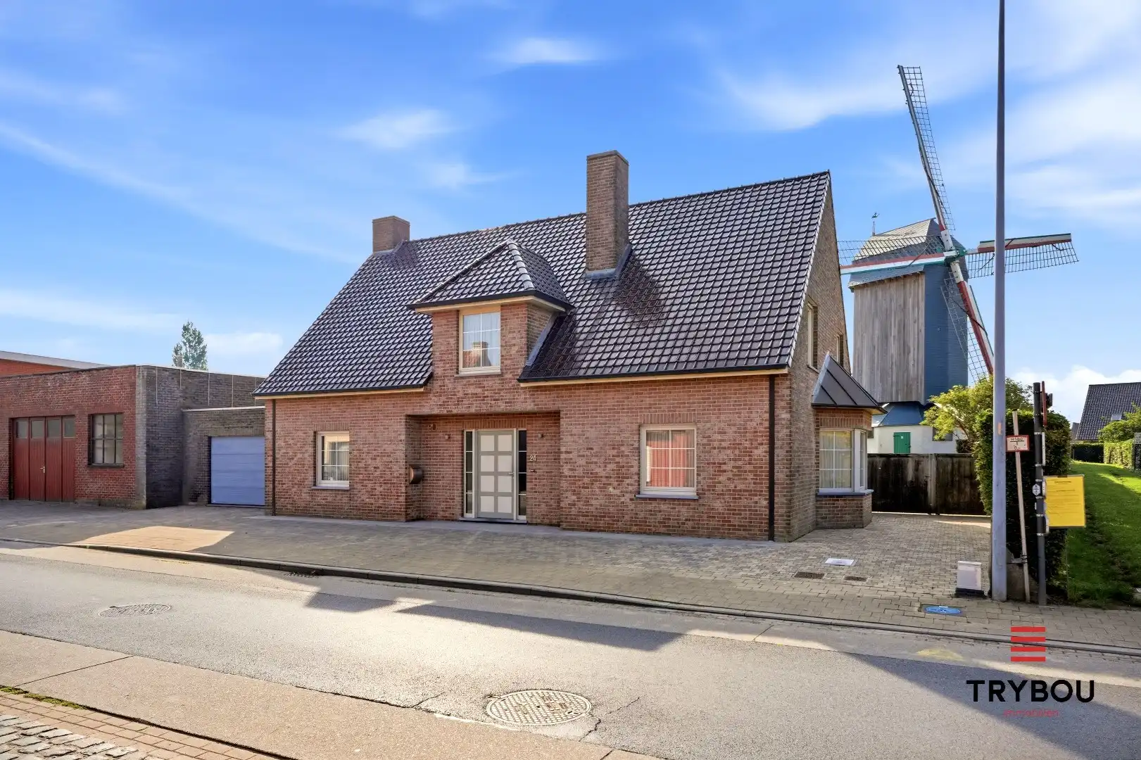 Ruime halfopen woning met 5 slaapkamers te koop in Werken met garage en ruime tuin! foto 2