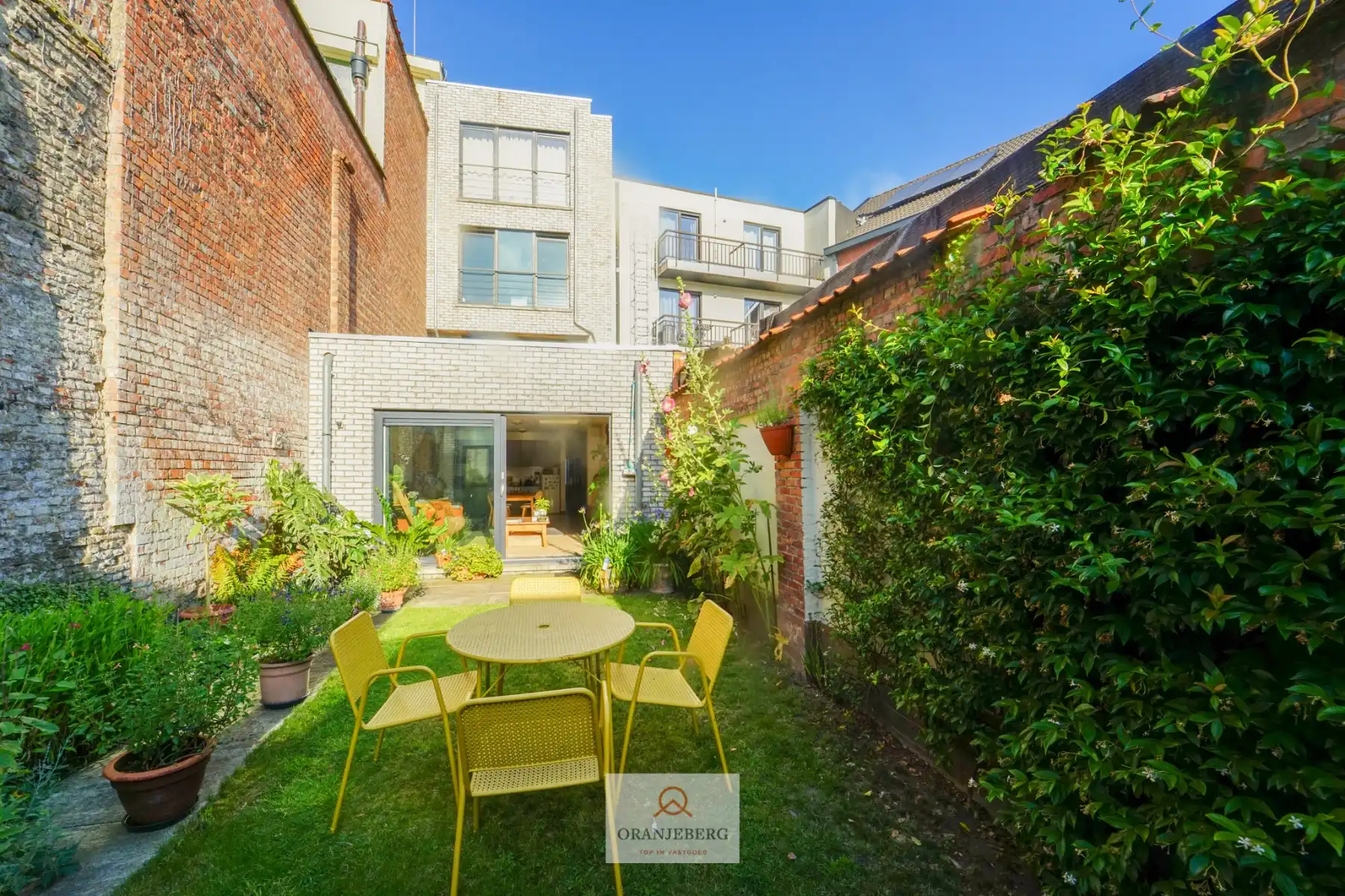 Gelijkvloers appartement met privétuin foto 2