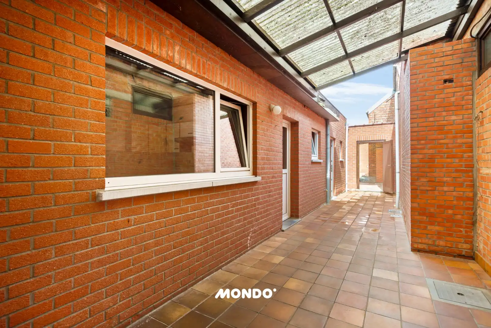 Veelzijdige rijwoning met tuin, binnenkoer en uitbouwmogelijkheden te Opwijk! foto 12