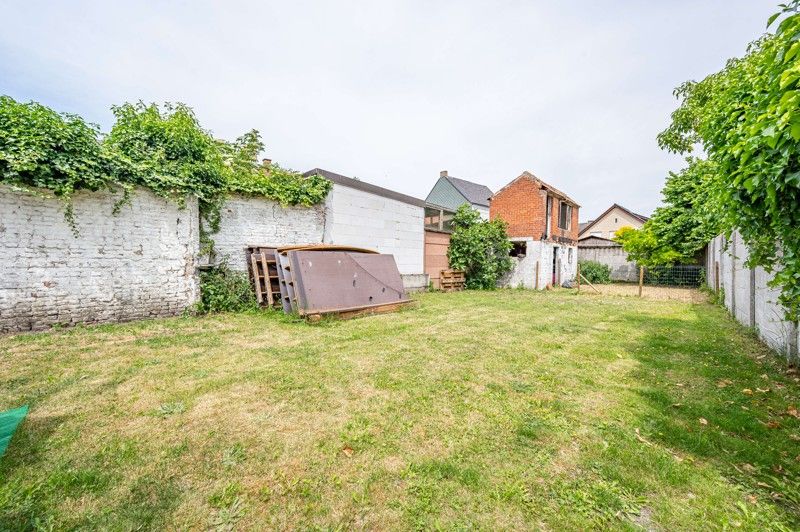 Gerenoveerde ruime gezinswoning met handelsruimte, garage, tuin en 3 slaapkamers op een perceel van 391 m² in het centrum van Wakken. foto 22