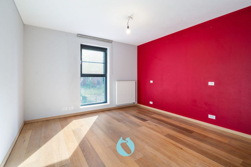 Deze woning is rustig gelegen in woonerf Brielken te Evergem foto 7