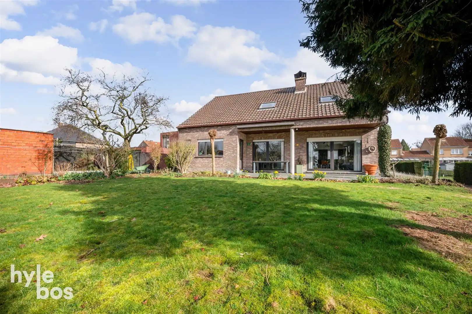 Ruime open bebouwing met 4 slaapkamers, garage en tuin in zeer rustige ligging foto 24