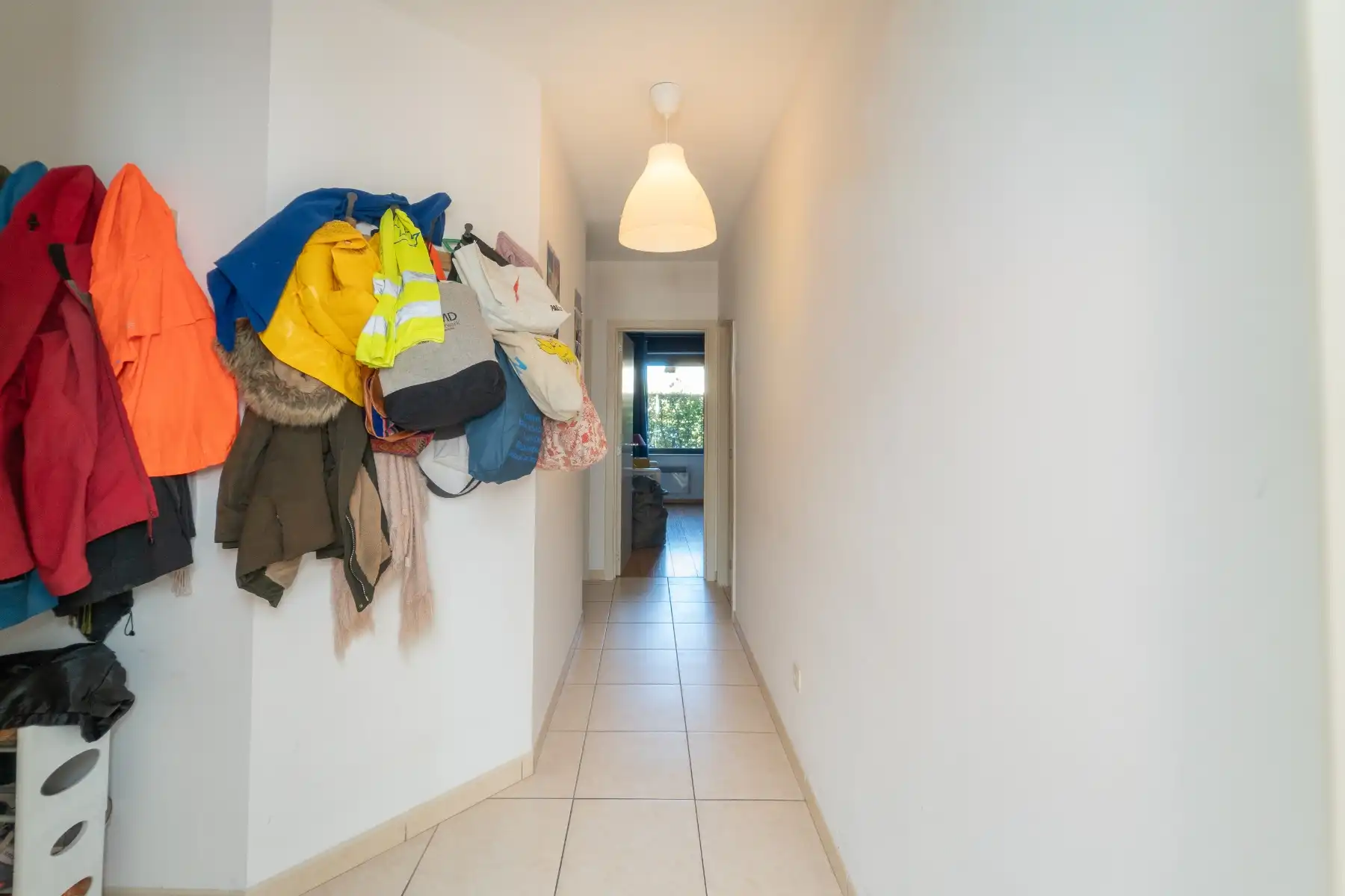 Gelijkvloers 2-slpk appartement met tuin! foto 15