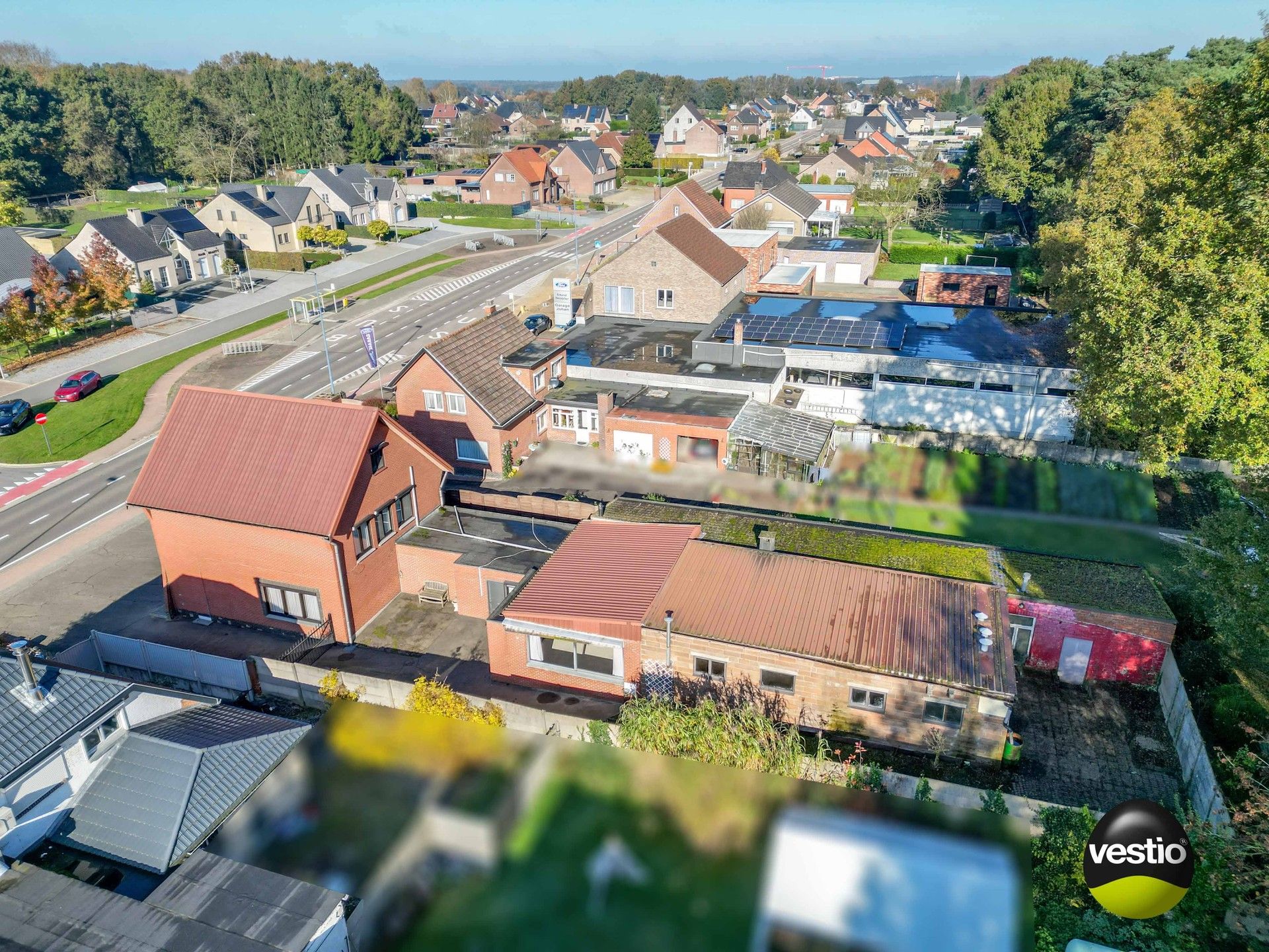 RUIME WONING MET 200 M² WERKPLAATSEN TE OPGLABBEEK foto 3