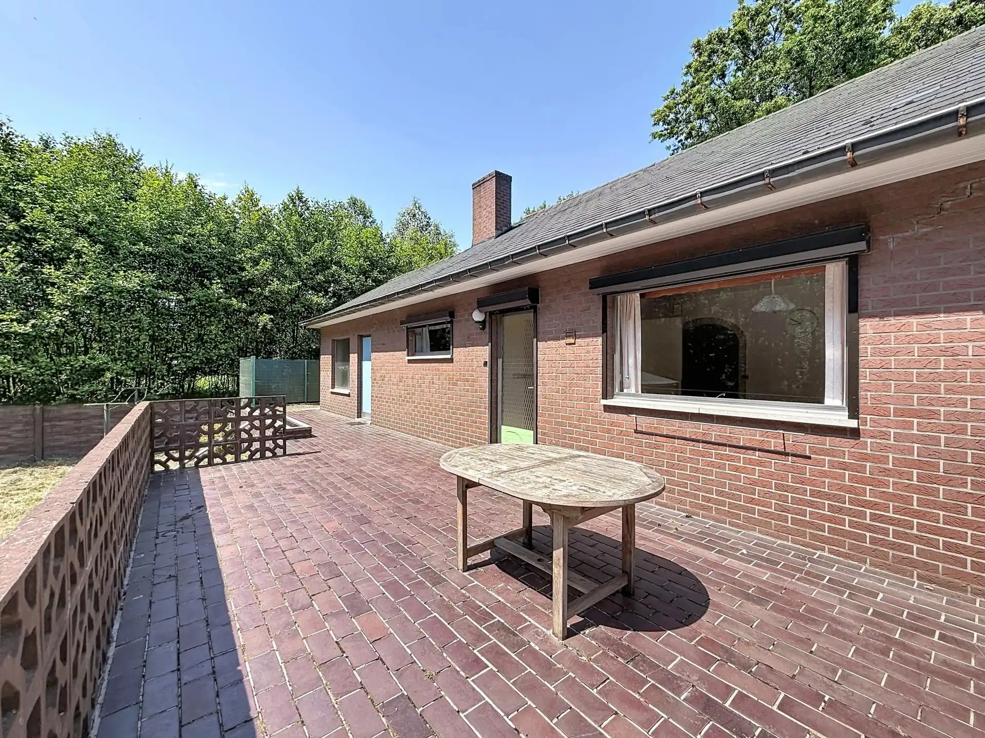Op te knappen woning met veel mogelijkheden op een mooi perceel. foto 25