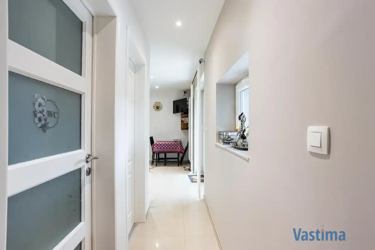 Instapklare, energiezuinige familiewoning met 4 slaapkamers, tuin en garage foto 11