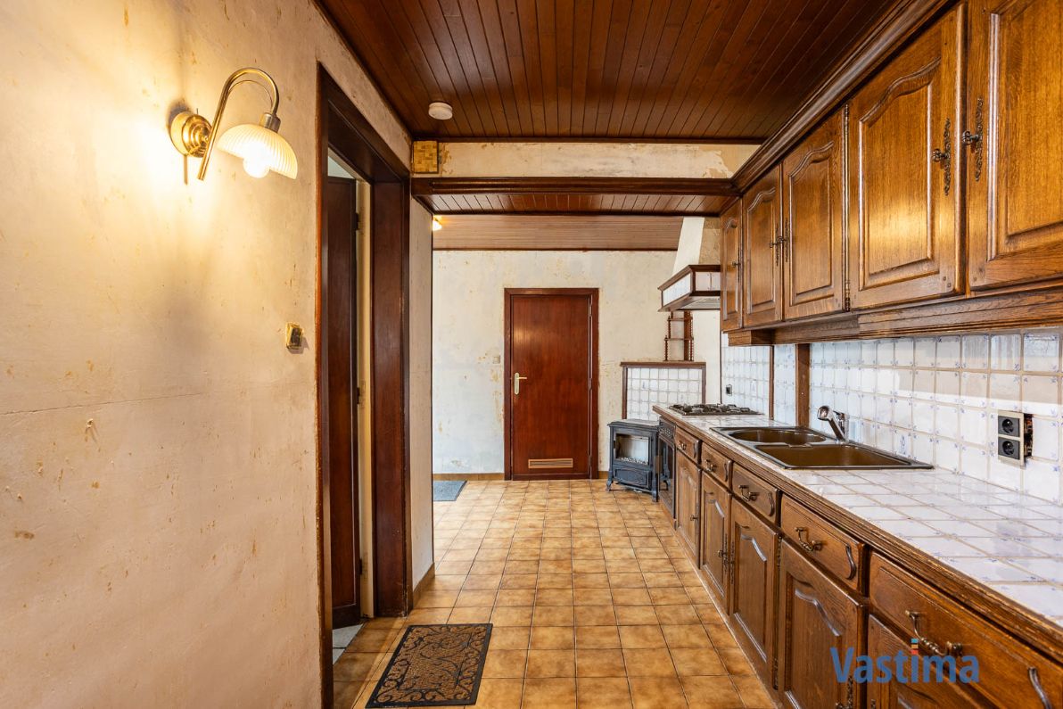 Te renoveren, halfopen woning met zuid gerichte tuin foto 7