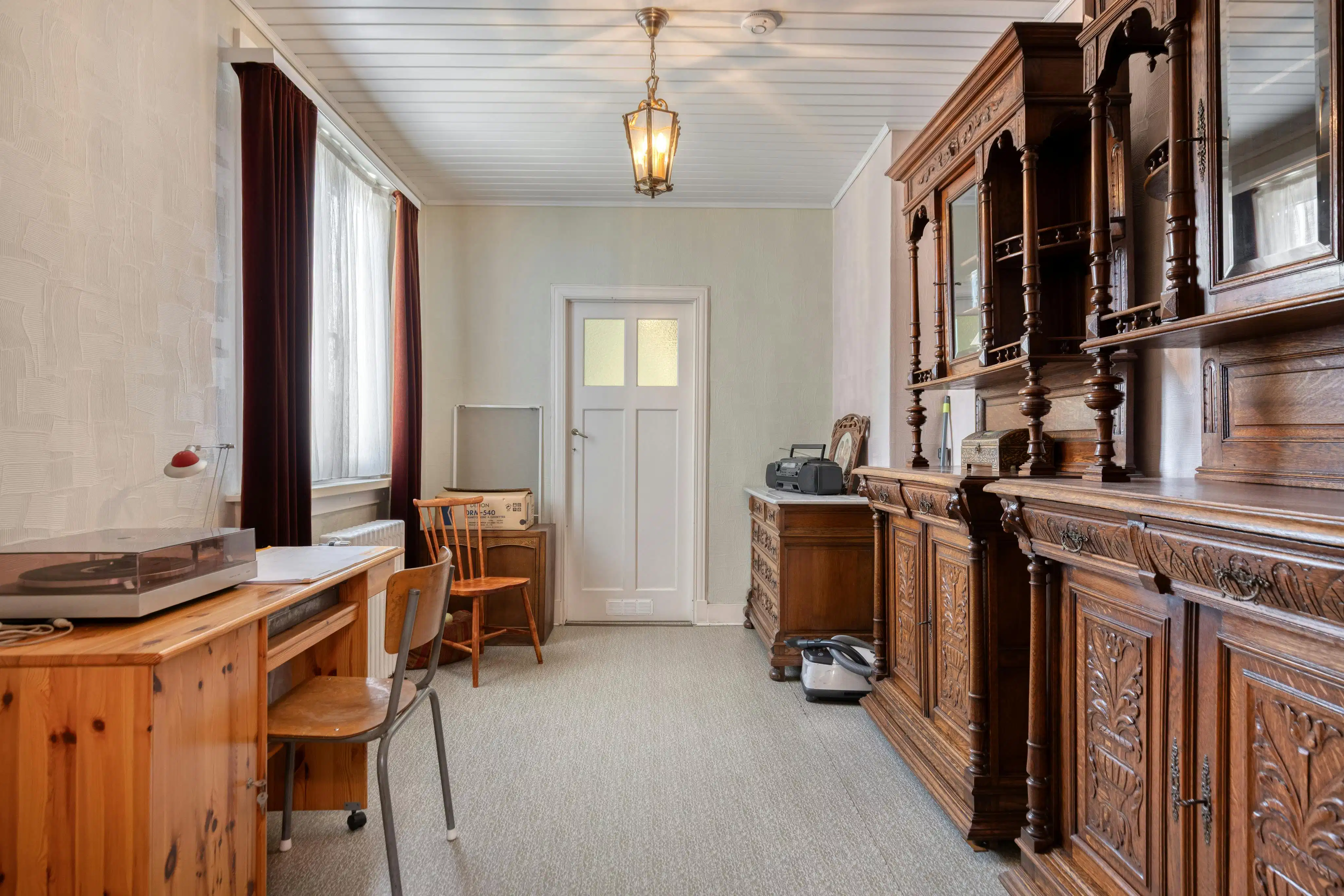 Charmant huis met ruime en zonnige tuin te koop in Merksem! foto 17