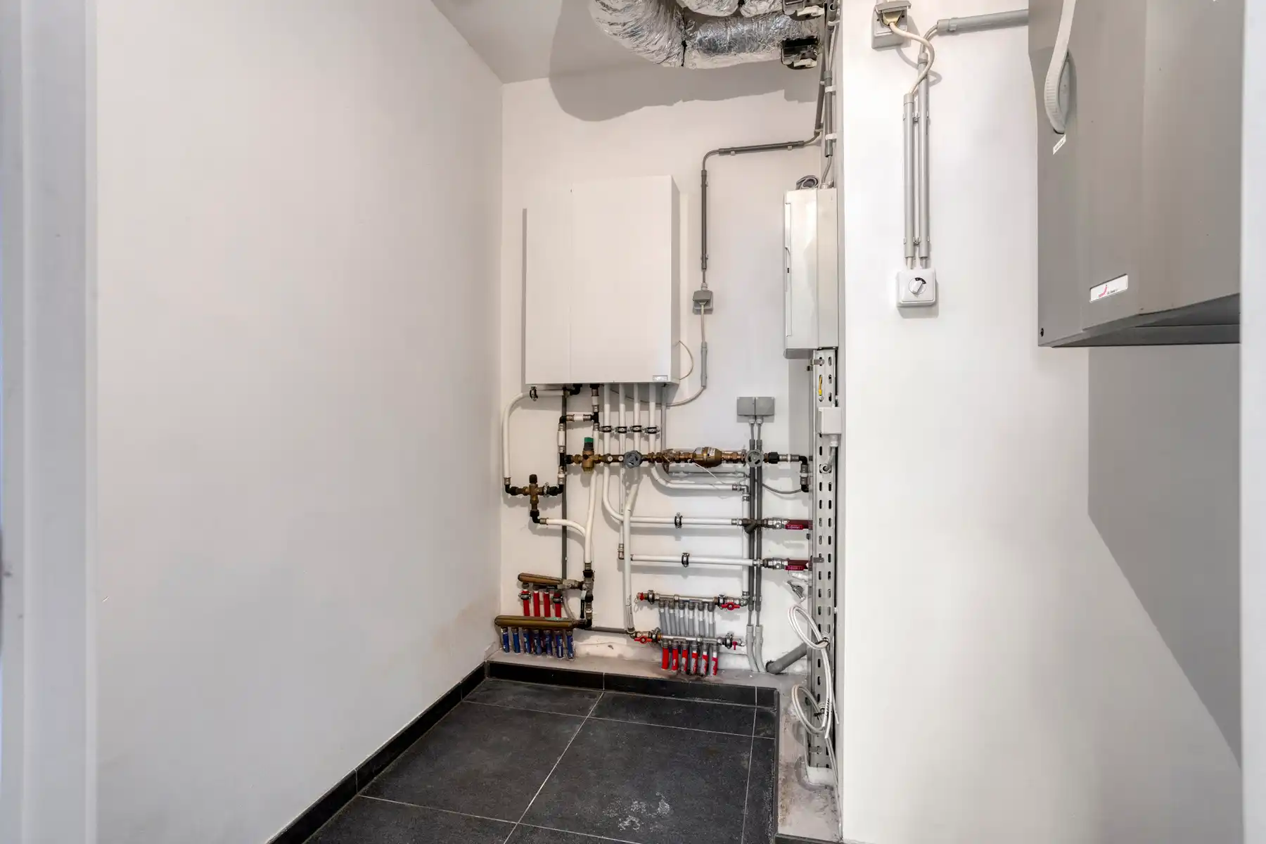 Leemans Immobiliën biedt u dit energiezuinige appartement aan met een adembenemend uitzicht over Brussel. foto 16