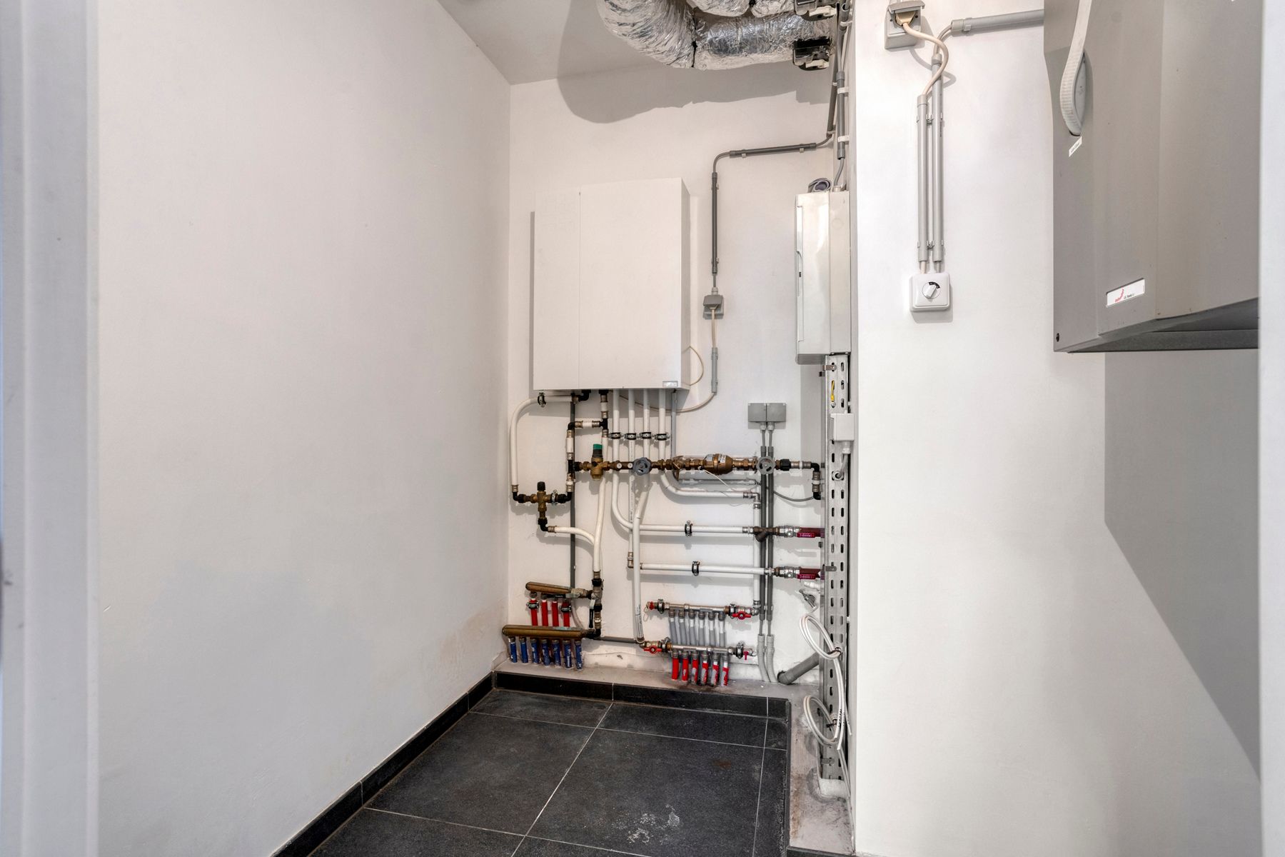 Leemans Immobiliën biedt u dit energiezuinige appartement aan met een adembenemend uitzicht over Brussel. foto 16