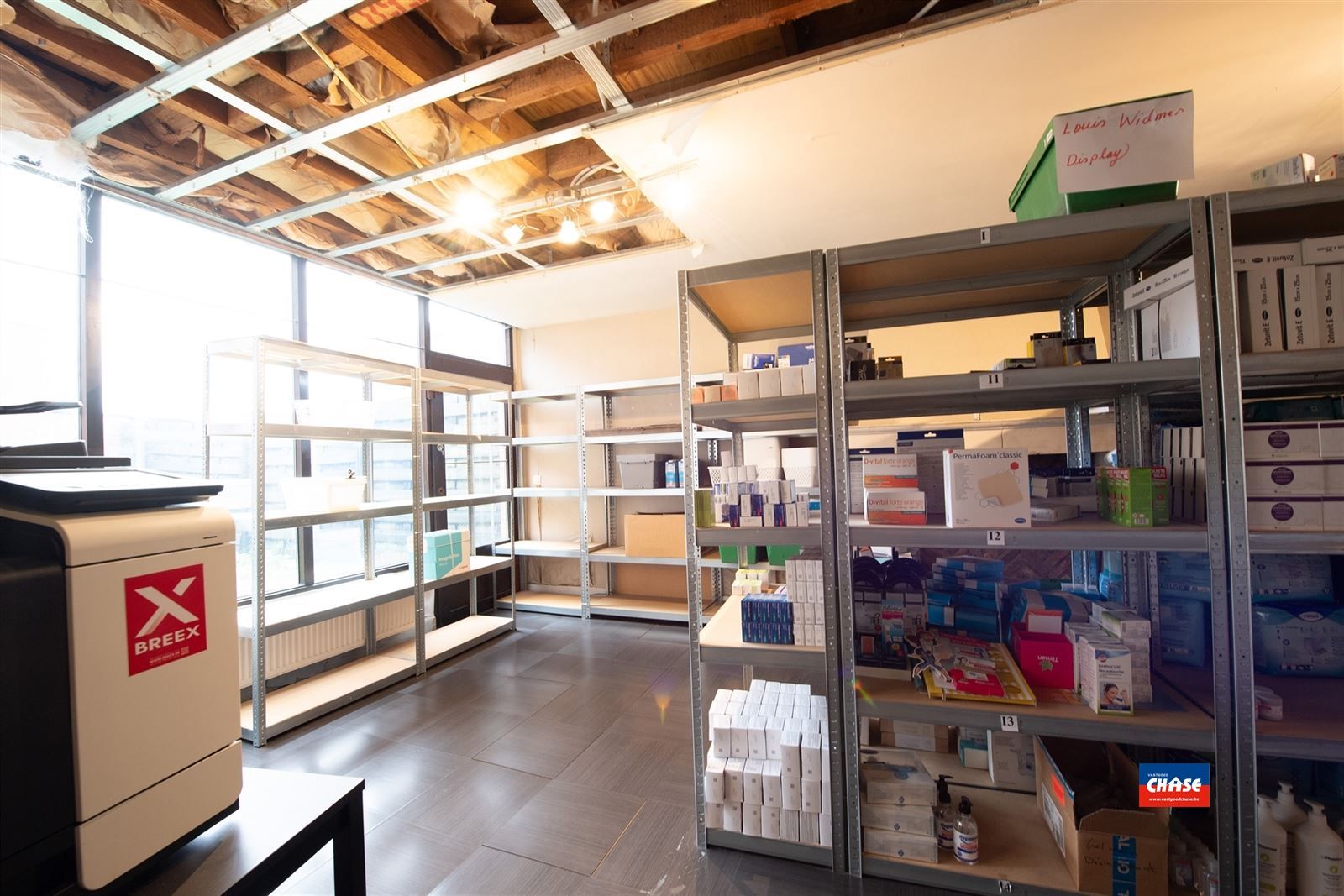 Handelshuis met groot appartement, garage en tuin foto 19