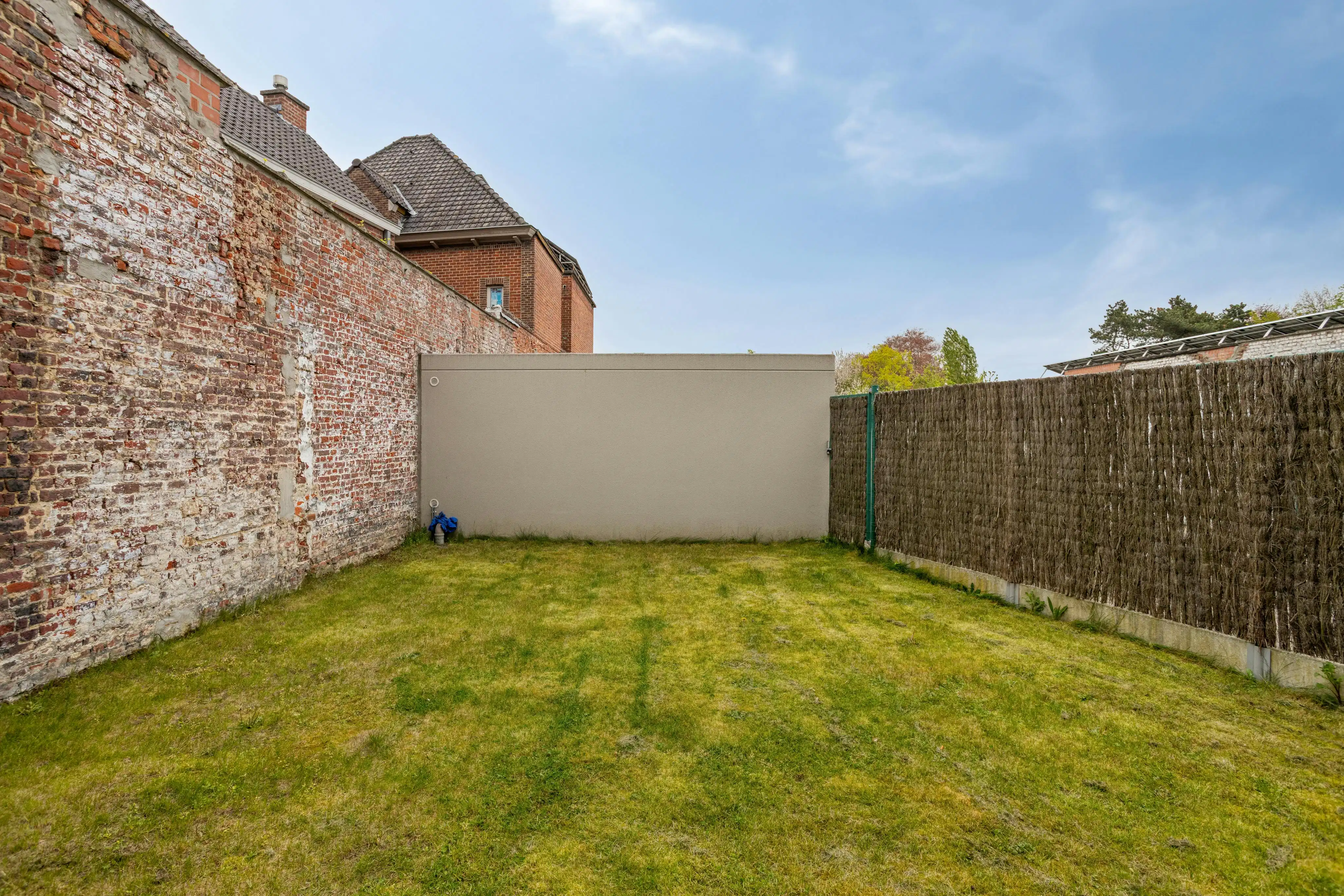 Modern appartement met private tuin in centrum Roeselare foto 12