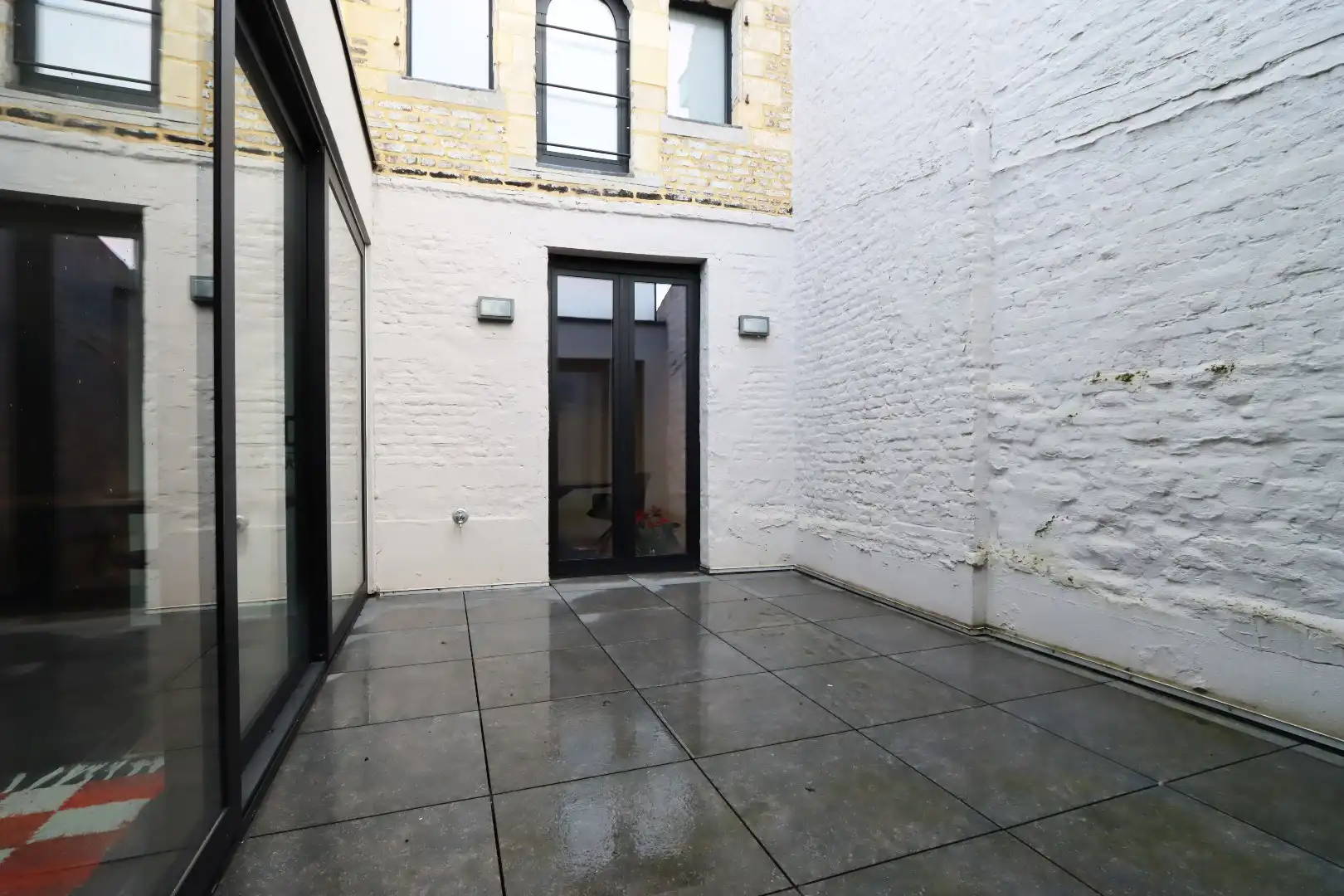 Trendy appartement met gezellig binnenterras en lift in het hartje van Maaseik foto 15