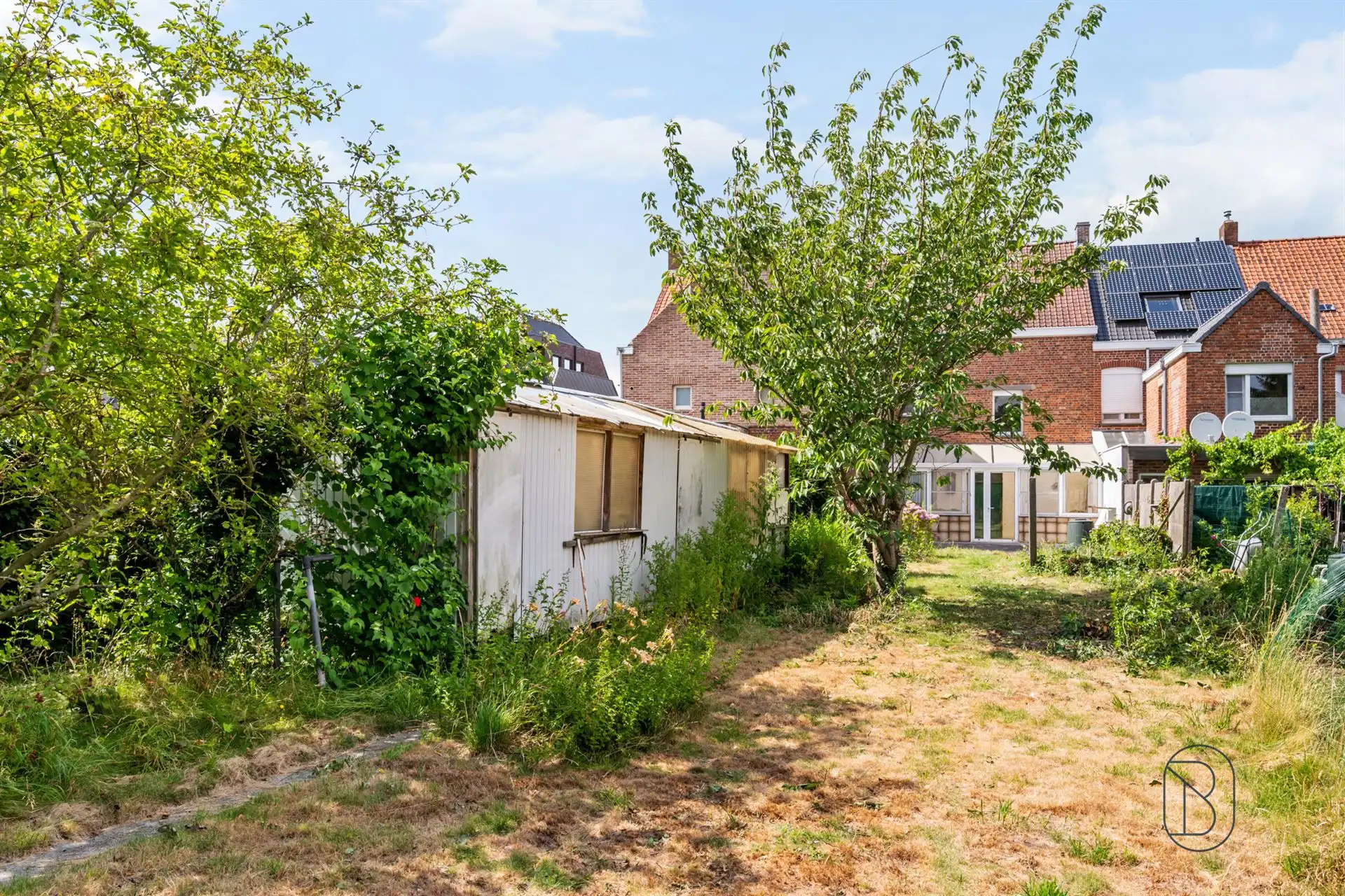 Gezinswoning met 6 slpk, ruime tuin en atelier in Wevelgem foto 3