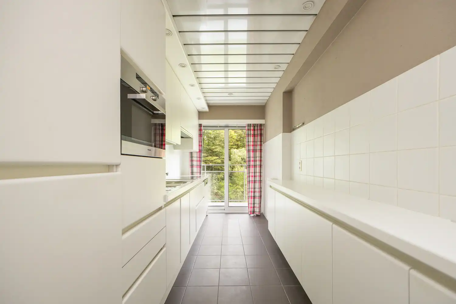 IN OPTIE: kevin@wellimmo.net voor meer info! Energiezuinig (EPC B) hoekappartement met uitzonderlijke lichtinval en riant terras te Berchem foto 9