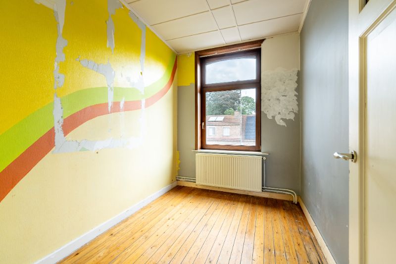 Ruime en veelzijdige rijwoning met garage achteraan en aparte ingang foto 13