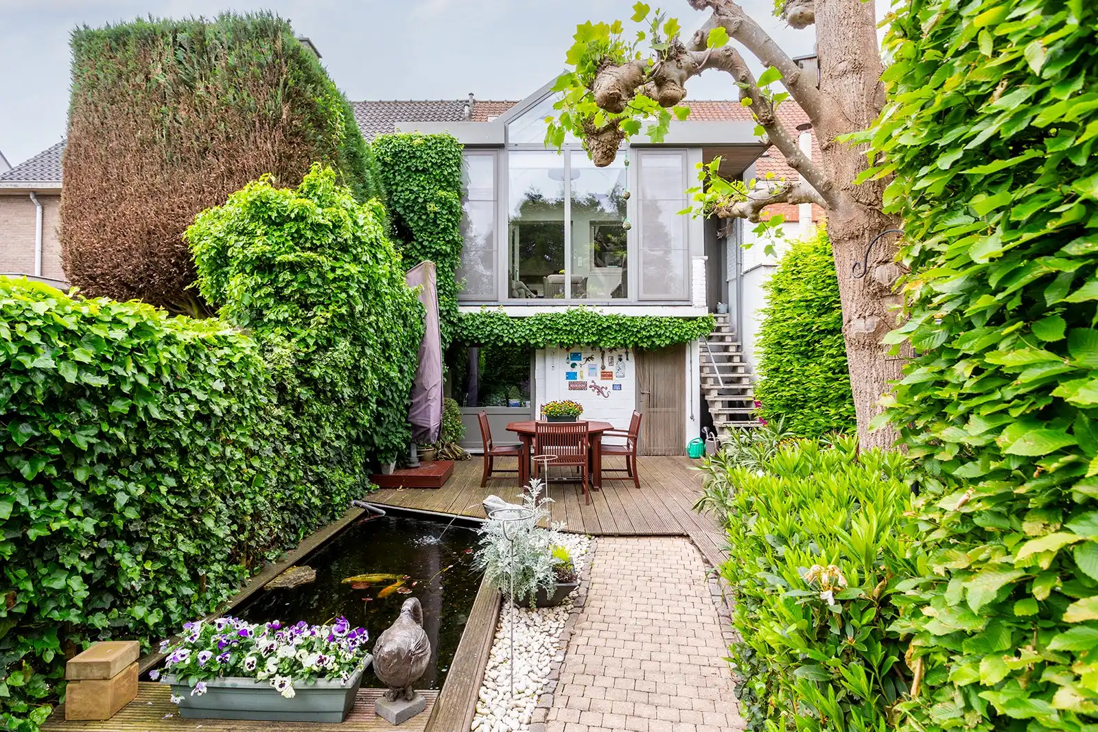 Instapklare bel-etagewoning met 3 slaapkamers en groene tuin foto 11