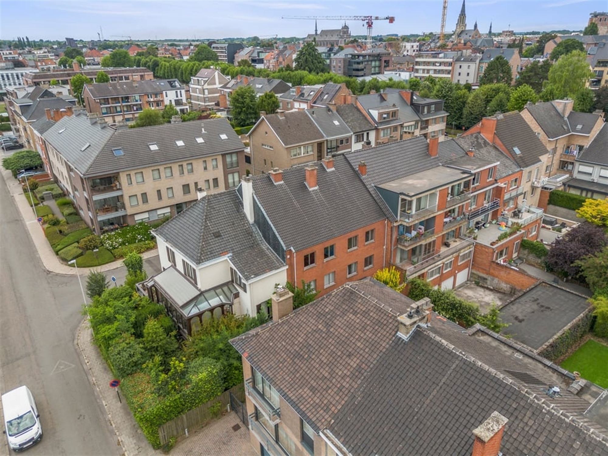OPBRENGSTEIGENDOM MET 6 APPARTEMENTEN EN 4 STAANPLAATSEN IN SINT-TRUIDEN  foto 4