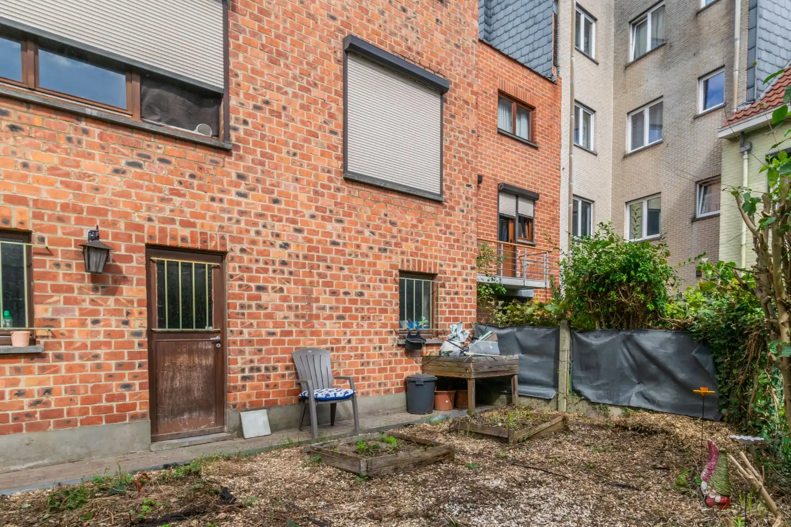 OPBRENGSTGEBOUW MET 2 APPARTEMENTEN, GARAGE & TUIN ! foto 3