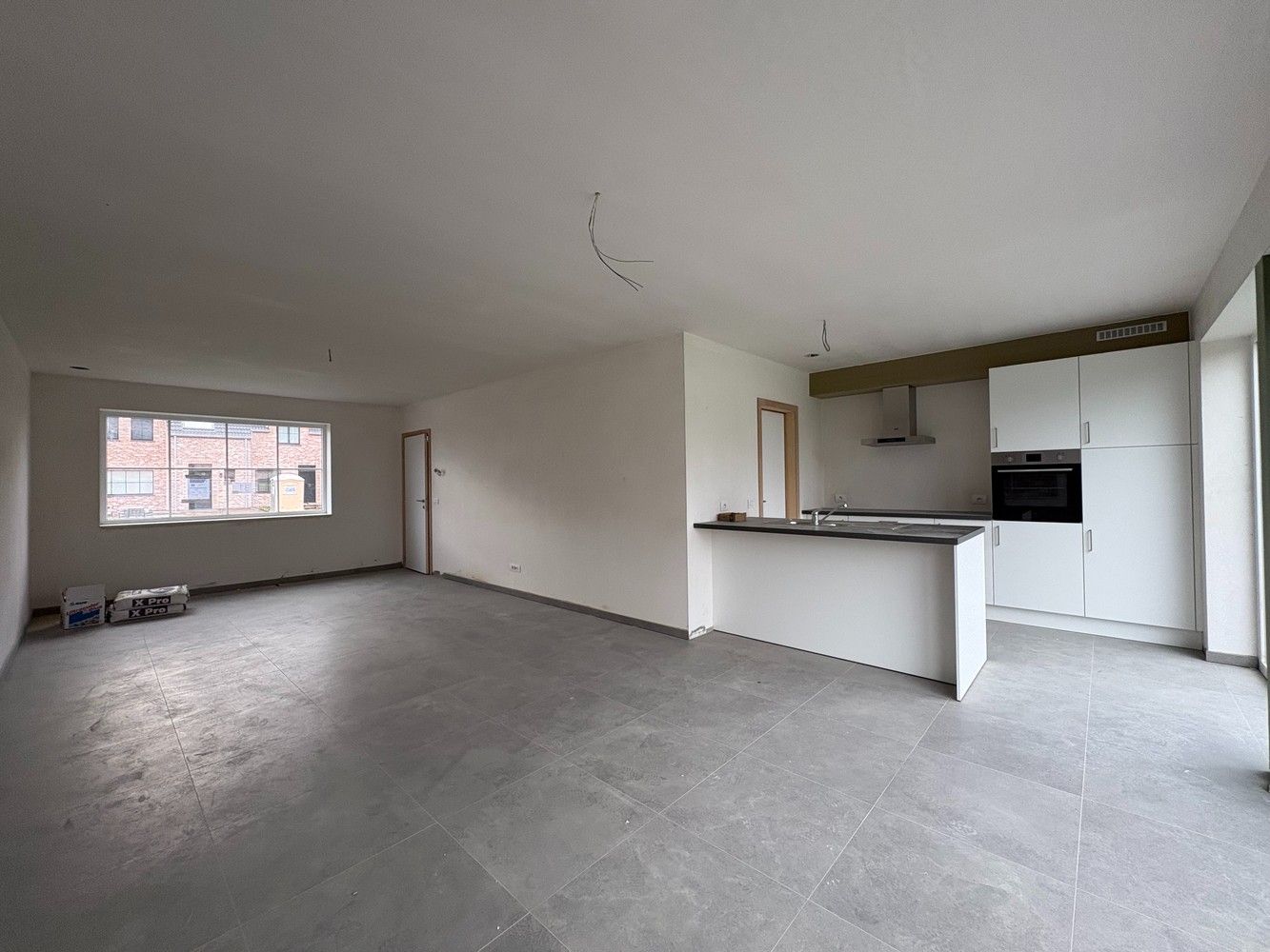 Nieuwbouwwoning met drie slaapkamers + carport foto 5