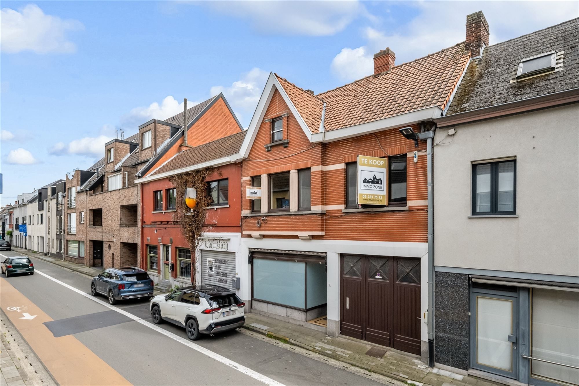 Centraal gelegen handelswoning met 3 slaapkamers en tuin. foto 24