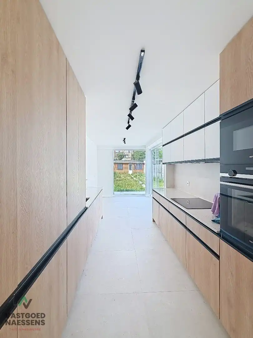 VOLLEDIG GERENOVEERDE 5 SLPK WONING – 2 BADKAMERS – ZONNIGE ZW-TUIN foto 4